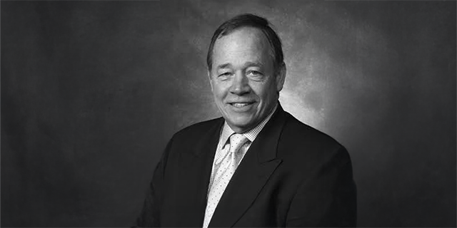 a man in a suit and tie